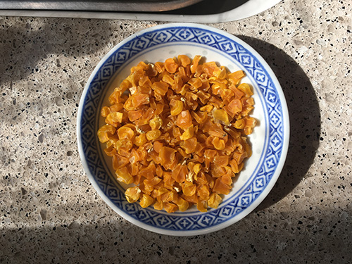 Corn flakes dried as part of their summer research. (Image courtesy of Lily Weaver.)